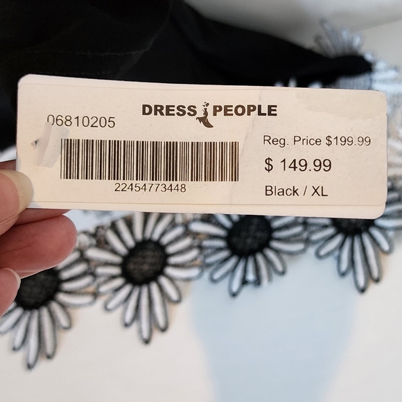 NWT Cartise Black Cut Out Sleeve Bottom Angled Top with Appliqued Flower Trim - Picture 7 of 12